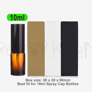 May include: A 10ml amber glass spray bottle with a black cap is displayed beside three rectangular boxes in brown, white, and black. The image text states the boxes are for 10ml spray cap bottles.