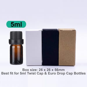 May include: An amber glass bottle with a black twist cap, accompanied by three rectangular cardboard boxes in white, black, and brown. The text 5ml is displayed above the bottle, and the text Box size: 26 x 26 x 56mm Best fit for 5ml Twist Cap & Euro Drop Cap Bottles is below.