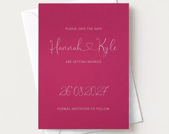 May include: A magenta save the date card with white text that reads PLEASE SAVE THE DATE, Hannah & Kyle, ARE GETTING MARRIED, 26.08.2027, and FORMAL INVITATION TO FOLLOW. The card features a thin white heart icon between the names.