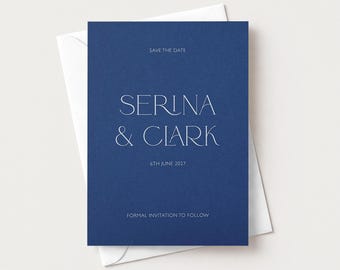 May include: A rectangular navy blue save the date card with white text reading SAVE THE DATE, SERINA & CLARK, 6TH JUNE 2027, and FORMAL INVITATION TO FOLLOW, resting on top of a white envelope. The card features a clean, modern sans-serif font.