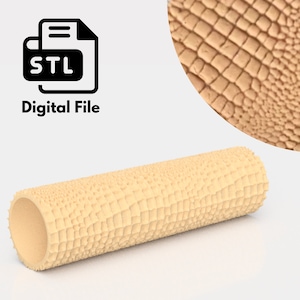 Può includere: Un rullo beige stampato in 3D con una texture di pelle di coccodrillo. Il rullo è un file digitale disponibile in formato STL.