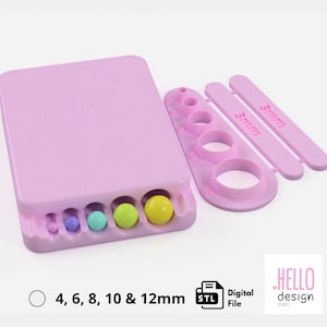 May include: A pink 3D printed mold for making round candy. The mold has five different sized cavities for making candy with diameters of 4, 6, 8, 10, and 12 mm. The mold is shown with a set of five round candies in the cavities.