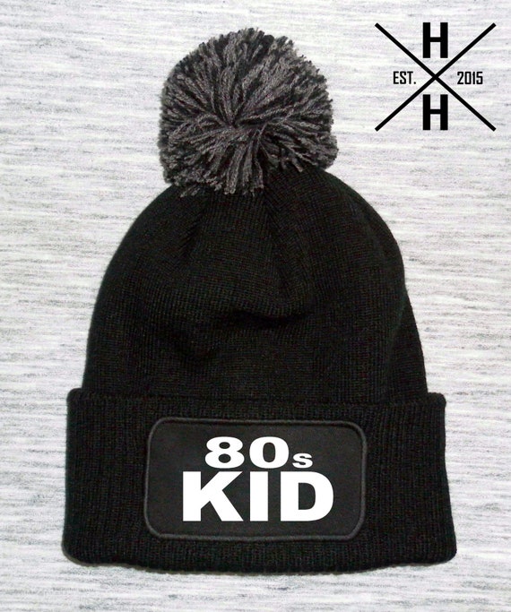 kids black bobble hat