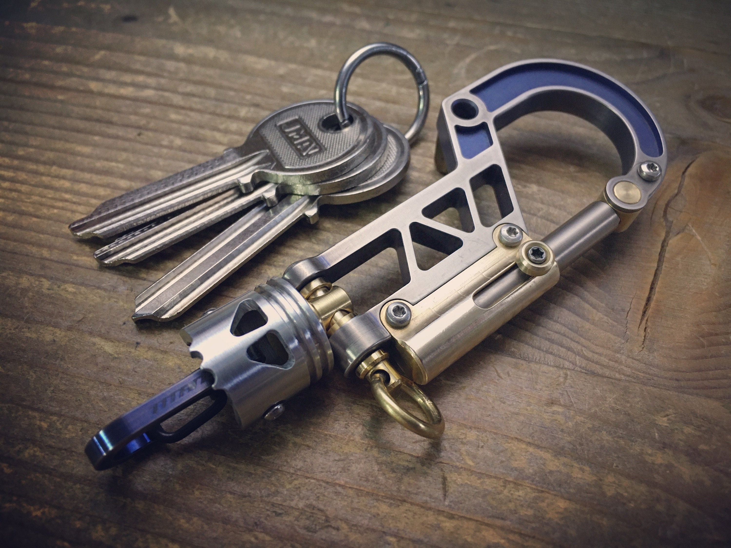 Hamans Titanium Carabiner Keychain Tightens Screws and Pops Beer