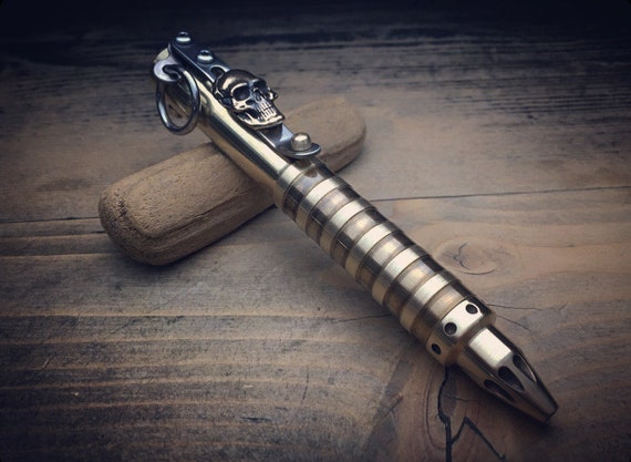 TOP MOD / Boker Cal.50 Brass Ballpoint Pen with Solid Brass Skull Clip.