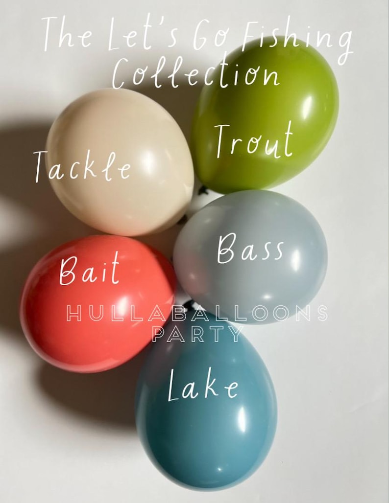 May include: A set of five balloons with fishing-themed text. The balloons are in the colors green, beige, gray, red, and blue. The text on the balloons reads "Trout", "Tackle", "Bass", "Bait", and "Lake".
