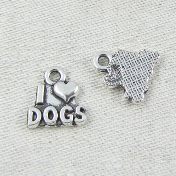 2 Dog charms antique silver tone A798