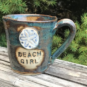 Beach girl starfish mug