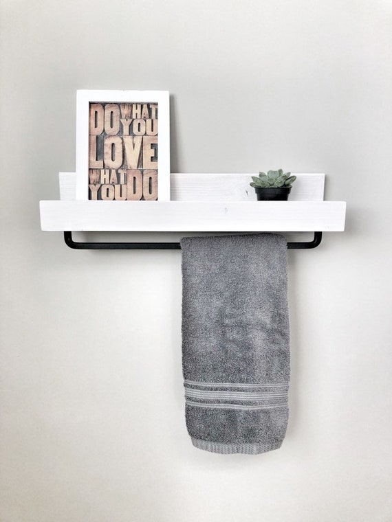 floating shelves for towels in bathroom