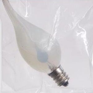 May include: A frosted glass light bulb in a flame shape, with a silver base. The bulb is inside a clear plastic bag. The bulb is designed to look like a candle flame.