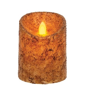 May include: A battery-operated, flameless candle with a textured, brown exterior. The candle has a realistic, flickering yellow LED flame. The cylindrical candle is designed to mimic the look of a traditional wax candle.