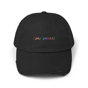May include: Black distressed baseball cap with the text "[gay panic]" embroidered in rainbow colors.