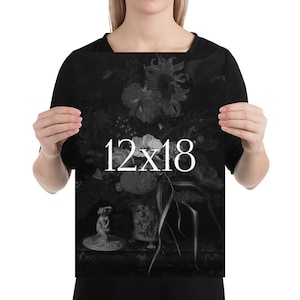 May include: Black and white print of a still life featuring a vase of flowers, a small statue, and the text "12x18".