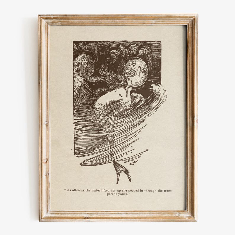 May include: A framed sepia-toned print featuring a mermaid in swirling water, with long flowing hair and a fish tail. The artwork includes the quote: "As often as the water lifted her up she peeped in through the transparent panes."
