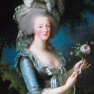 May include: A portrait painting of a woman in a blue dress with a white lace collar and a white and blue ribbon tied at the waist. She is wearing a white wig with a white feathered hat and a pearl necklace. She is holding a bouquet of white roses in her right hand.