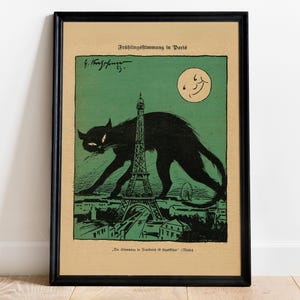 Puede incluir: L&aacute;mina art&iacute;stica vintage enmarcada que representa un gato negro caminando por un paisaje urbano con la Torre Eiffel. La obra de arte tiene una combinaci&oacute;n de colores verde y beige con el texto "Fr&uuml;hlingsstimmung in Paris" y una luna sonriente.