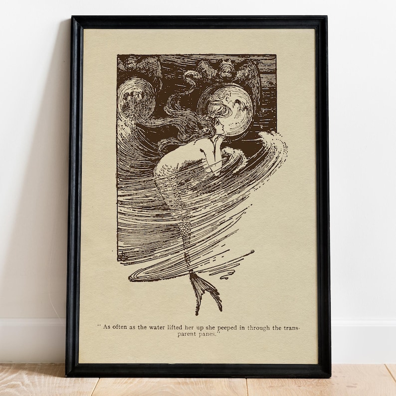 May include: Framed sepia-toned art print featuring a mermaid in a swirling sea, gazing at a large, round object. The artwork has a vintage aesthetic, with text at the bottom: "As often as the water lifted her up she peeped in through the transparent panes."