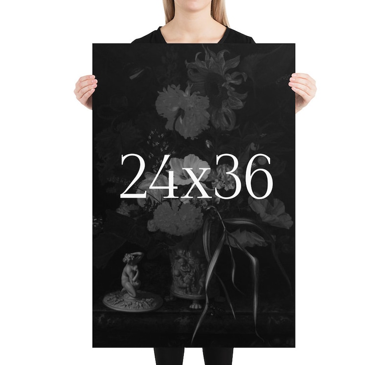 May include: Black and white poster print of a still life featuring a vase of flowers with a small statue in the foreground. The text "24x36" is printed in white on the poster.