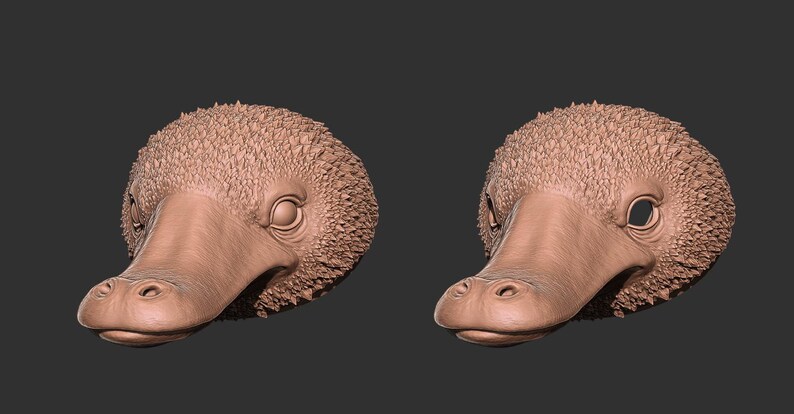 May include: Two detailed, light brown platypus head sculptures. One head has a closed eye, the other has an open eye. The sculptures have textured fur and a duck-like bill. The background is a solid dark gray.
