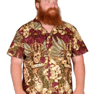 May include: A red, green, and gold short-sleeved button-down shirt with a skull and rose print. The shirt has the text "Carpe Noctem" on it.