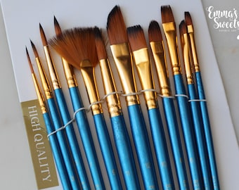 May include: A set of 12 blue handled paint brushes with gold ferrules and brown bristles. The brushes are labeled with numbers from 1 to 12. The packaging says "High Quality" and "Emma's Sweets".