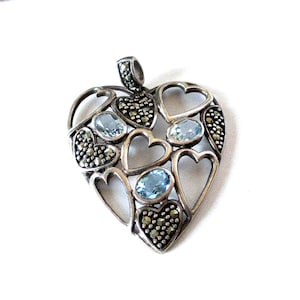 Gr 110 Art Deco Sterling Silver, Marcasite and Blue Topaz Stylized Heart Pendant