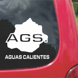May include: White vinyl decal with the text "AGS" and "AGUAS CALIENTES" in a white outline. The decal is shaped like the state of Aguascalientes, Mexico.
