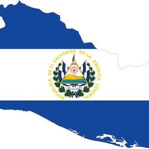 May include: A map of El Salvador in blue and white, with the country's flag design. The flag features a central emblem with text and a mountain scene, framed by a wreath. The flag's colors are blue and white.