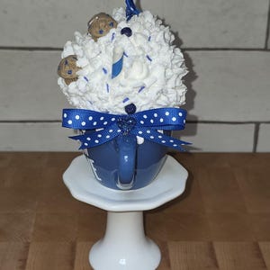 Handle side view of handmade blueberry muffin mug with faux cream and sprinkles, perfect for farmhouse or bakery-themed décor.