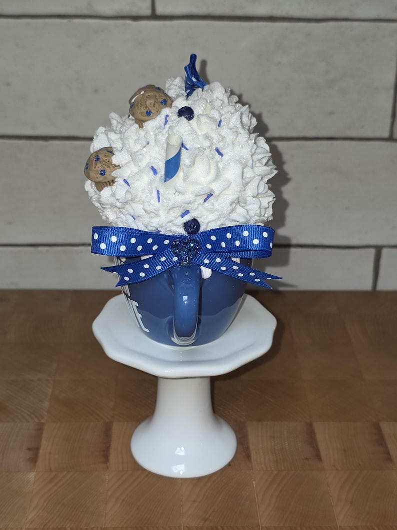 Handle side view of handmade blueberry muffin mug with faux cream and sprinkles, perfect for farmhouse or bakery-themed décor.