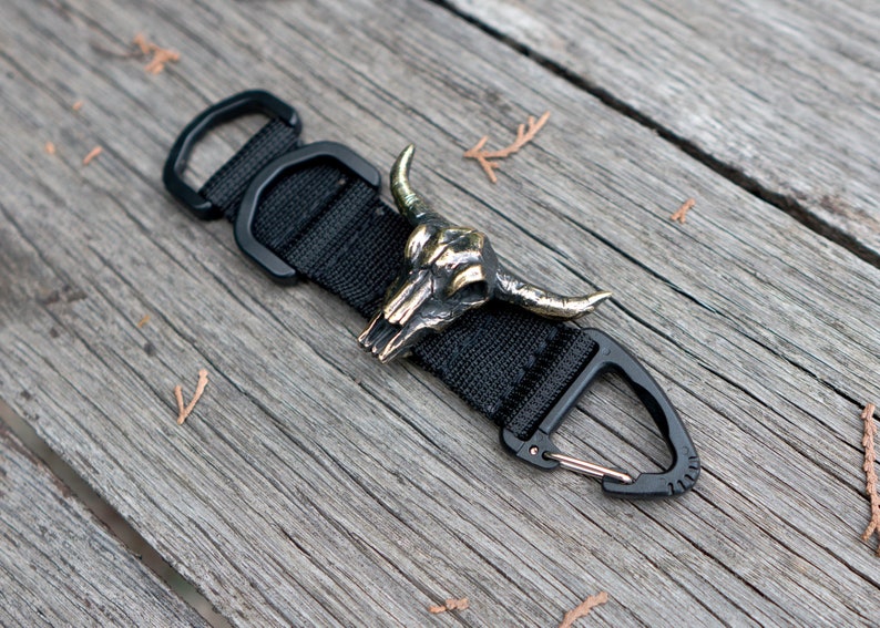 Lanyard keychain \u2013 Designer keychains with a bronze bead-clip.