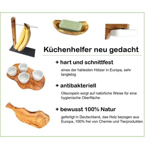 Puede incluir: Utensilios de cocina de madera de olivo, que incluyen un jabonera, un soporte para pl&aacute;tanos, una bandeja de servir con cuencos peque&ntilde;os y una tabla de cortar. El texto "K&uuml;chenhelfer neu gedacht" se muestra en la imagen. El texto "hart und schnittfest" se muestra en la imagen. El texto "antibakteriell" se muestra en la imagen. El texto "bewusst 100% Natur" se muestra en la imagen.