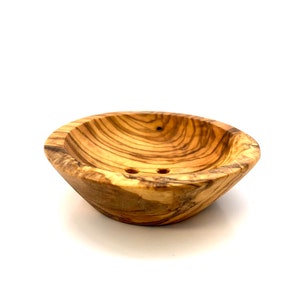 Round soap dish made of olive wood