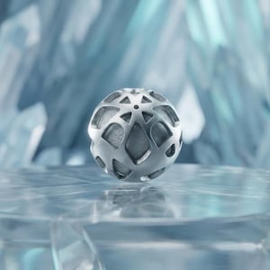 May include: A silver sphere with an openwork design featuring geometric shapes. The sphere is set against a blurred, icy blue background, creating a cool, textured aesthetic. The sphere's intricate pattern is the focal point.