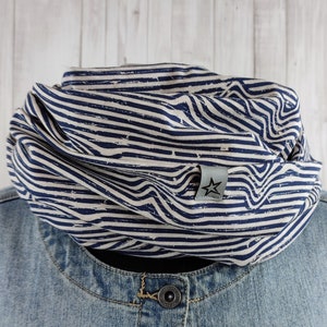 Loop made of jersey, irregularly striped in beige melange and dark blue, men women unisex