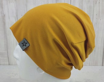 Beanie in mustard yellow, sewn from jersey, for men, women and big boys and girls