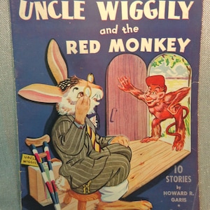 May include: A vintage children's book cover titled "Uncle Wiggily and the Red Monkey." The cover features an illustration of a rabbit wearing glasses and a suit, and a red monkey. The book has the text "10 Stories by Howard R. Garis."