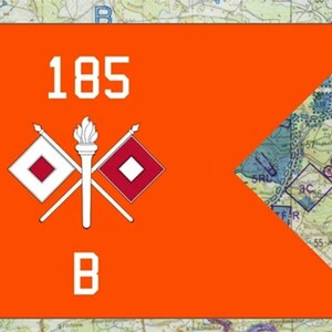 May include: An orange flag with the number "185" in white, the letter "B", and a torch with two crossed flags. The background is a detailed map with various markings and symbols.