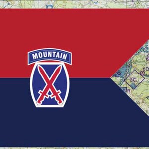 May include: A flag design with a red upper section and a blue lower section. A white and blue emblem with crossed swords and the word "MOUNTAIN" is centered on the flag. The background is a map.