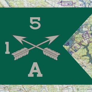 May include: A green flag with the numbers "5", "1", and the letter "A" in white. Two crossed arrows are in the center. The background is a map.