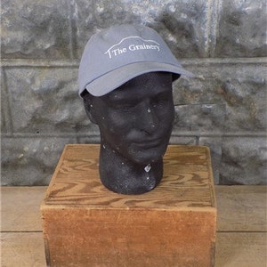 The Grainery Gray 100% Cotton Hat, One Size Fits All Adjustable Billed Cap, Billed Advertising Hat, Adjustable Velcro Strap, Standard Cap