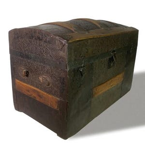 May include: Antique trunk with a domed top. The trunk features embossed metal panels, wooden accents, and metal hardware. The exterior has a distressed finish with shades of brown, green, and gold. The trunk has a rectangular shape.
