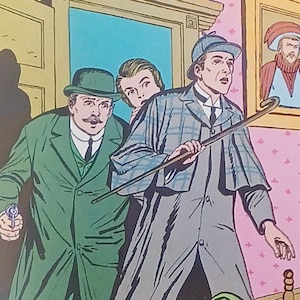May include: Three men in a room, one wearing a green coat and a hat, another wearing a gray coat and a hat, and the third wearing a blue shirt and a hat. The man in the gray coat is holding a cane. The room has a pink wall with a white pattern and a wooden bed with a green blanket.