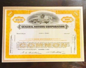 May include: A yellow and white stock certificate for 100 shares of General Motors Corporation, dated November 7, 1955. The certificate features a black and white illustration of a car factory and a car.