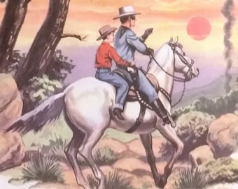 May include: A white horse with a brown saddle and bridle is ridden by two people. The rider in the front is wearing a cowboy hat and a blue shirt. The rider in the back is wearing a brown hat and a red shirt. The horse is walking through a forest with a sunset in the background.