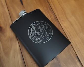 Metal beverage hip flask 8 oz. Black with Circle mountains themed image