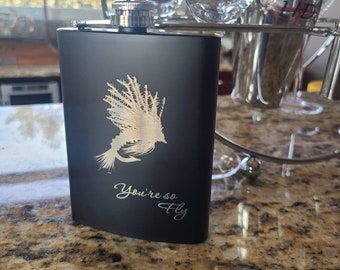 Metal beverage hip flask 8 oz. Black with Fly art fishing themed image