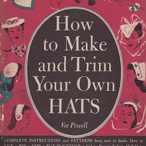 May include: A vintage book cover with a red background and a black circle in the centre. The title is "How to Make and Trim Your Own Hats" by Vee Powell. The cover features illustrations of women wearing various hats.