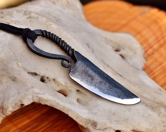 Small viking knife pendant, comes supplied with jewelry cord.