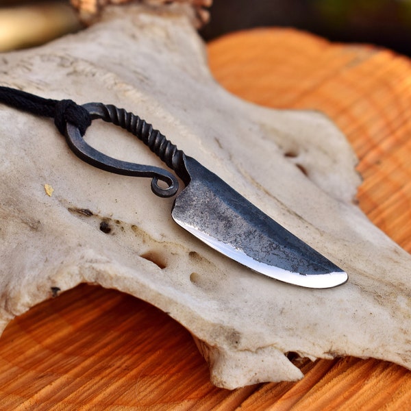 Small viking knife pendant, comes supplied with jewelry cord.